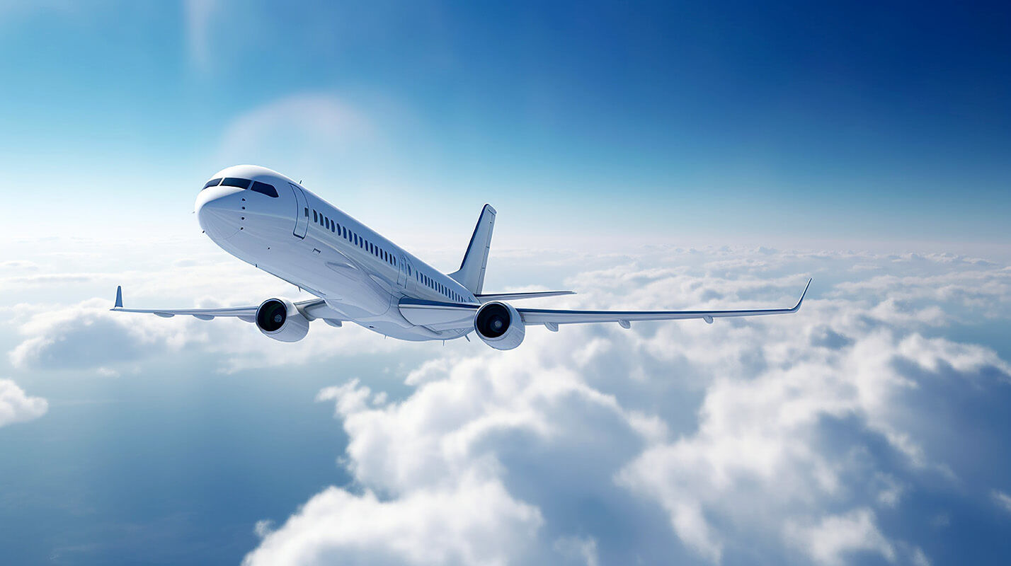 Airplane flying above clouds