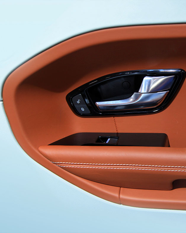 Interior of a car door, which is commonly manufactured via compression moulding. 