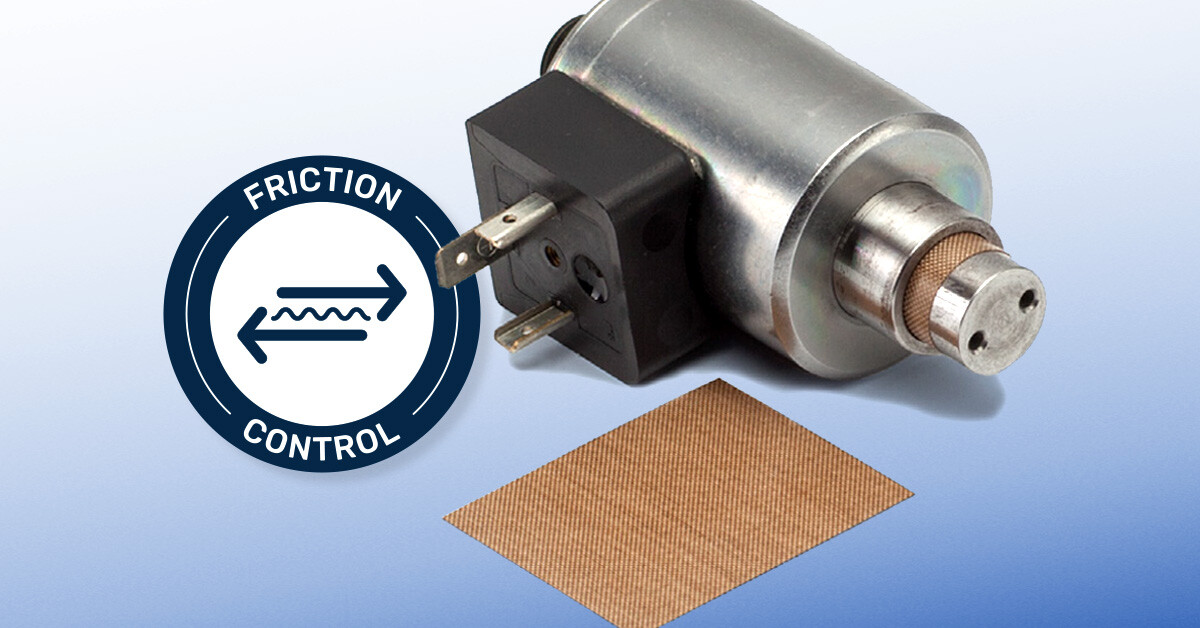 Friction control logo in front of solenoid and a sample of Versiv Low Friction Lining