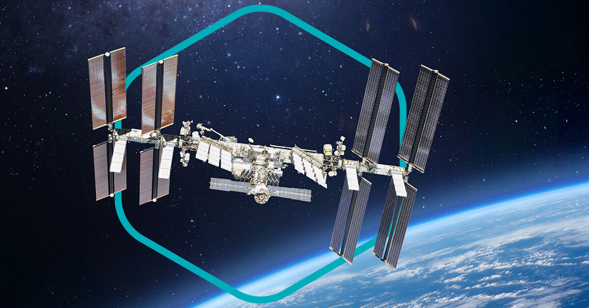 The International Space Station in orbit, highlighted with the Versiv hexagon shape