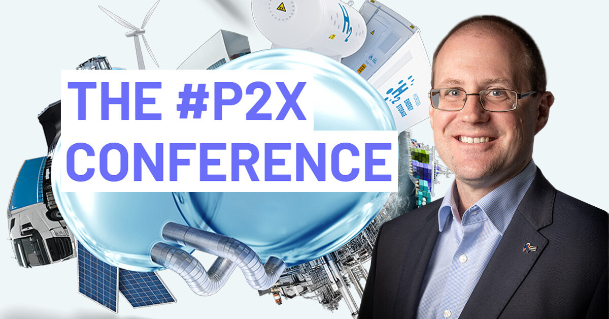 Frank Sonnenschein in front of The P2X Conference logo